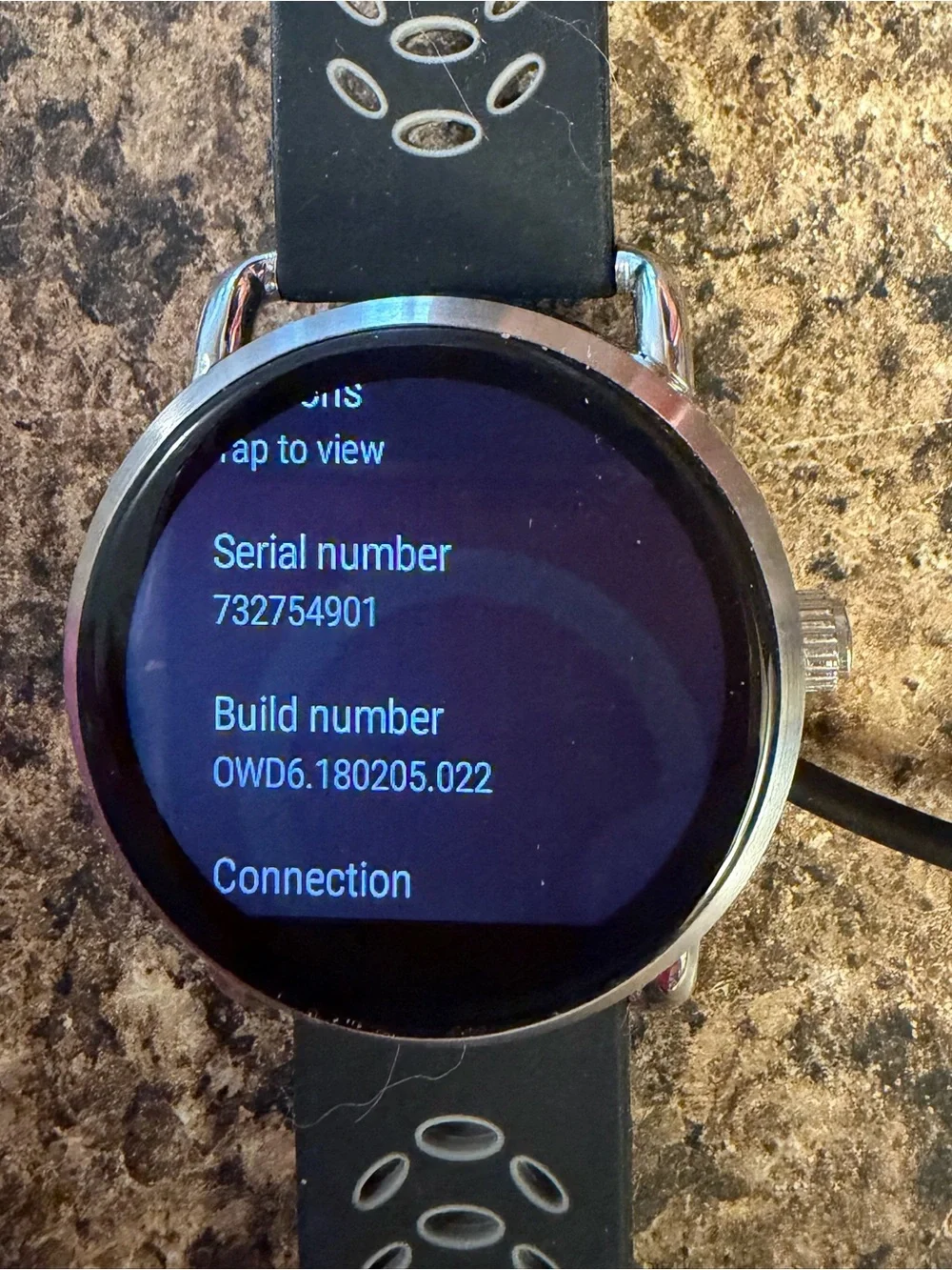 Fossil Q Wander Smartwatch with silicone and silver metal band and charger